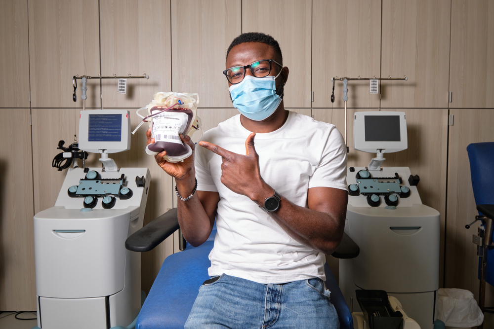 At,A,Hospital,A,Happy,Donor,Is,Showing,Off,His